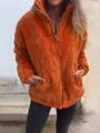 Detail of orange corduroy stand collar jacket showing textured fabric and pocket. - S / Tops / Orange Red