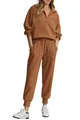 Detailed view of women's ribbed half-zip sweatshirt and matching jogger lounge set in rust - Camel