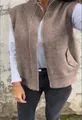 Close-up of brown knitted vest for women featuring stand collar and zipper closure detail. - S / Tops / Khaki