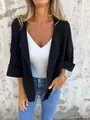 Lässiger schwarzer Cardigan aus Wildlederimitat für Damen in Lifestyle-Umgebung - Schwarz