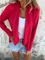 Close-up detail of vibrant red faux suede cardigan showing texture and fit on a model. - S / Tops / Red