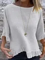 Dettaglio della camicetta bianca in cotone e lino da donna con orlo a balze e texture - Bianco