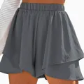 Close-up of gray elastic waist shorts with ruffled layered design and textured fabric - S / Bottoms / Gray