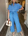 Set casual a due pezzi a righe blu con camicia a maniche corte e pantaloni larghi - XS / Top E Pantaloni / Blu