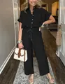 Dettagli del set due pezzi gessato nero con camicia a maniche corte - XS / Top E Pantaloni / Nero