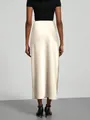 Eleganter champagnerfarbener Satin-Midirock mit hoher Taille und glänzender Textur - S / Unterteile / Aprikose