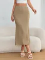 Detail view of an elegant khaki knit midi skirt with a textured stretch fishtail design. - S / Bottoms / Khaki
