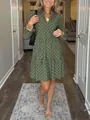 Detailed view of the V-neck and diamond digital print pattern on the green dress. - S / Army Green