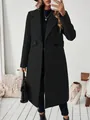 Vista de cuerpo completo de un elegante abrigo de lana negro con solapas - S / Tops / Negro