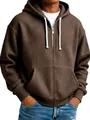 Close-up view of a brown waffle-knit men's zip-up hoodie with hood and pockets. - Coffee