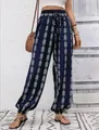 Boho style women's navy blue lantern pants with white geometric arrow print and drawstring waist. - S / Bottoms / Navy Blue