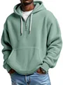 Detalle de la sudadera con capucha de punto gofre verde salvia para hombre de corte holgado - Verde claro