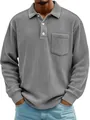 Close-up of a men's grey corduroy long-sleeved polo shirt with chest pocket detail - Gray