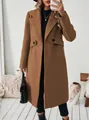 Élégant manteau long en laine camel mélangée à revers dans un décor intérieur chic - Marron