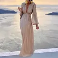 Elegant shimmering apricot sequined maxi dress featuring deep V-neck and long sleeves detail - S / Dresses / Champagne