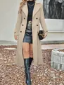 Elegant beige double-breasted woolen coat with lapels shown in a full-body outdoor shot - Apricot