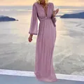 Elegant purple sequined V-neck maxi dress detail shot in a scenic coastal setting - S / Dresses / Pink