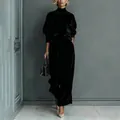 Elegantes schwarzes Samt-Zweiteiler-Set mit Langarm-Top und weiter Hose für Damen. - Schwarz