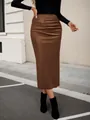 Detailed view of elegant high-waisted brown leather midi skirt with side ruching - S / Bottoms / Brown