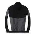 Detail view of a men's sport windbreaker with black, grey and white color blocking - XS / Tops / Black Patchwork Grey