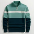Detailed view of a men's color-blocked half-zip knit sweater with premium texture. - S / Tops / Emerald Green