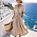 Elegant beige bohemian maxi dress with black contrast piping and a twisted waist detail - S / Apricot