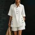 Elegant white linen two-piece set featuring short-sleeved buttoned shirt and shorts. - S / Top And Bottom / White