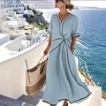Light blue bohemian maxi dress with elegant black trim for a summer resort look - S / Blue