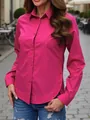 Elegant pink long-sleeved button-down blouse for women shown in a street setting - Rose Red