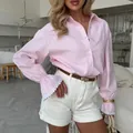 Detail of pink striped shirt featuring elegant flared cuffs with delicate lace trim - 3XL / Tops / Pink (Lace Flare Sleeve)