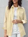 Detail shot of a women's yellow and white striped long-sleeve shirt in a casual chic style - Yellow (Regular)