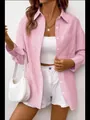 Detailed shot of a pink striped long-sleeve shirt paired with white shorts and bag - Pink (Regular Fit)
