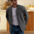Detail view of men's casual grey jacket in a warm lifestyle kitchen setting - S / Tops / Dark Gray