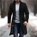 Close-up detail of a men's stylish black mid-length wool overcoat with gold buttons - S / Tops / Black