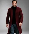 Detail shot of a man wearing a burgundy mid-length wool overcoat over a black turtleneck - S / Tops / Burgundy
