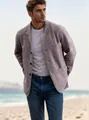 Men's trendy casual grey textured jacket worn over a white t-shirt at the beach - S / Tops / Light Gray