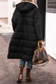 Back view of long black hooded puffer jacket worn with jeans and brown boots - S / Tops / Black