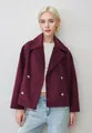 Close-up detail of a burgundy double-breasted short wool coat featuring a wide lapel design - Dark Red