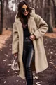 Stylish beige long teddy fleece coat styled with leather pants in an outdoor setting - S / Tops / Apricot