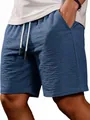 Detailed shot of men's blue textured casual shorts with white drawstring and pockets - S / Bottoms / Navy Blue