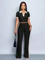 Full-body view of women's 2-piece set with contrast polo top and side-striped wide-leg pants - S / Top And Bottom / Black