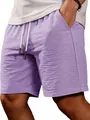 Detail shot of men's purple casual drawstring shorts featuring a premium slub texture - Purple