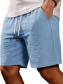 Close-up of men's light blue casual shorts showing breathable linen-like fabric texture - S / Bottoms / Blue