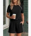 Close-up detail of a women's black casual two-piece shorts set with white piping stripes - S / Top And Bottom / Black