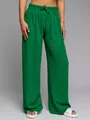 Detailed view of vibrant green high-waisted wide-leg pants featuring textured crepe fabric - S / Bottoms / Green