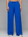 Detail of high-waisted royal blue wide-leg trousers with drawstring waist and flowing fit. - Blue