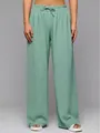 Detail of sage green high-waisted wide-leg trousers with drawstring and textured fabric - S / Bottoms / Light Green