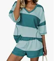 Vista dettagliata di un set sportivo da donna a strisce con top a maniche corte. - Taglia S / Top E Pantaloni / Verde