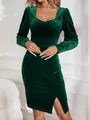 Detail view of emerald green velvet dress with square neck and puff sleeves - S / Dark Green
