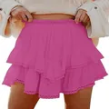 Detail view of Bohemian fuchsia tiered ruffle mini skirt featuring delicate lace trim - S / Bottoms / Bright Pink